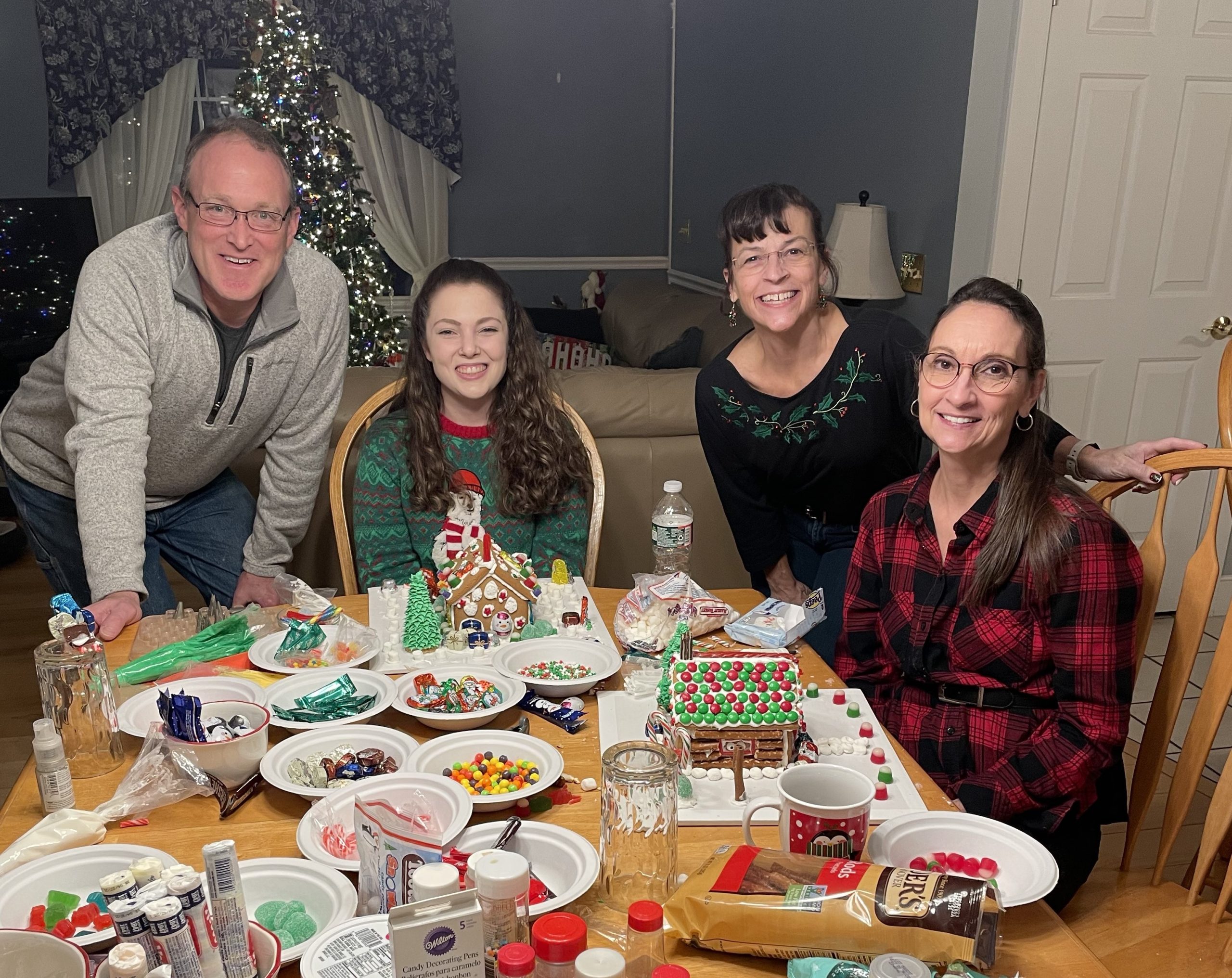 4 People with Gingerbread Houses