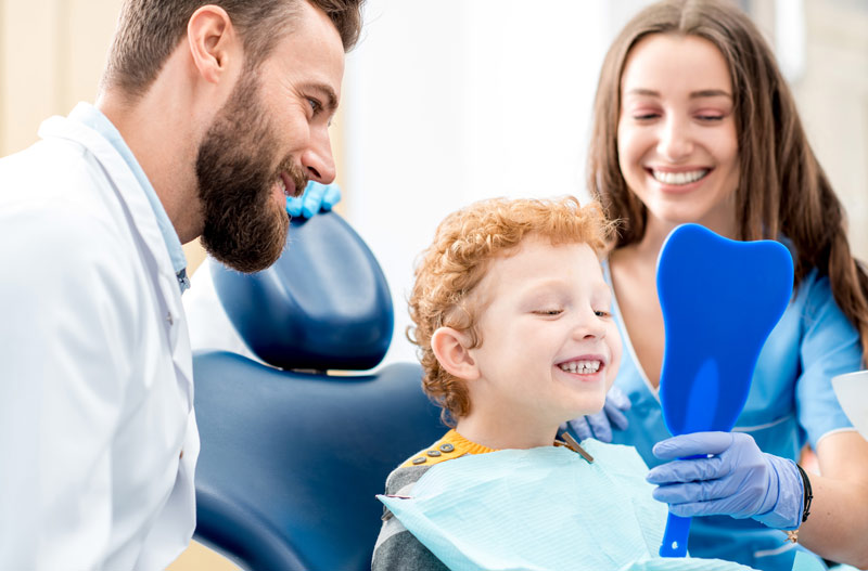 child at dentist in Amherst, NH